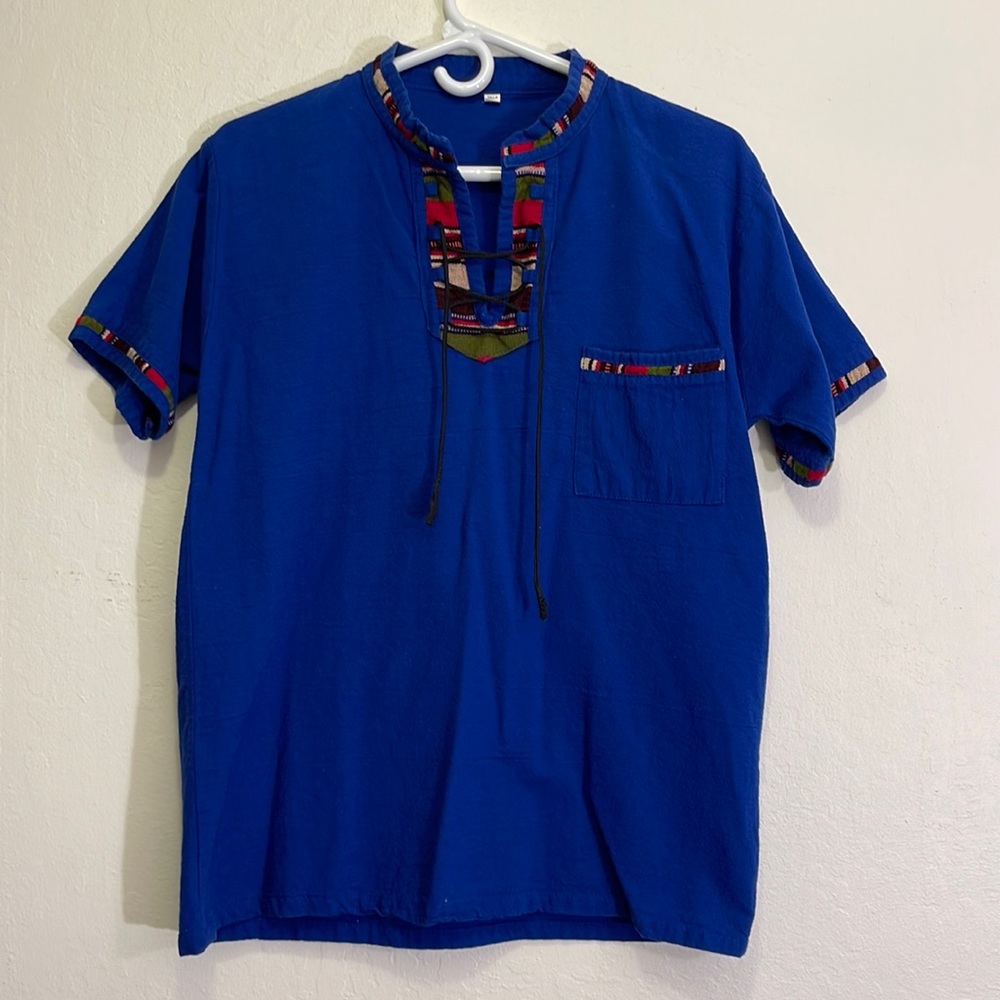 Guatemalan shirt size Large men. Fits a medium. Great eye catcher 9/10 condition
